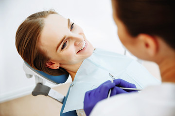 Fototapeta premium Dentist examining a patient's teeth in the dentist.