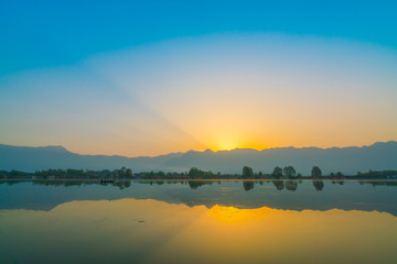 Sunrise on Dal lake, Kashmir India .