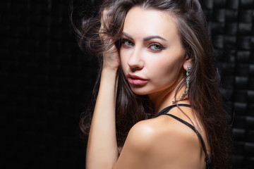 Fototapeta premium Portrait of a pretty young brunette.