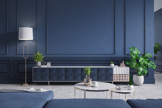 Modern Interior Of Living Room,blue Tv Cabinet With  Sofa , Dark Blue Wall And Concrete Gray Tile Floor,3d Rendering