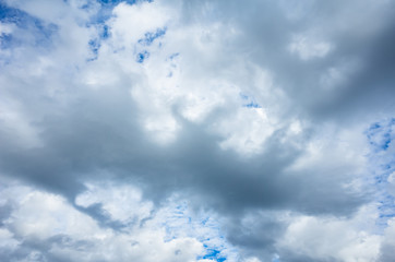The sky in the clouds with the sunlight. The texture of the clouds, the background image.	