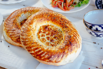 Asian naan or non - oriental bread on white.