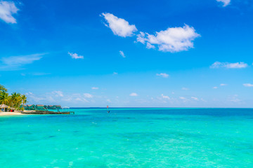 Naklejka na ściany i meble Beautiful tropical Maldives island with white sandy beach and sea .