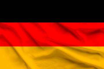 Obraz premium silk national flag of Germany with the folds