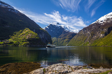Famous Geiranger fiord in Norway. Spring time beautiful weather and colours.