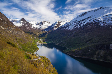 Fototapeta na wymiar Famous Geiranger fiord in Norway. Spring time beautiful weather and colours.