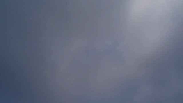 The Cloudy sky above the Lombard Alps, near Lake Como, Italy - May 2019