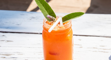 Smoothie on white wood