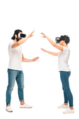 bearded latin man and woman wearing virtual reality headsets and gesturing isolated on white