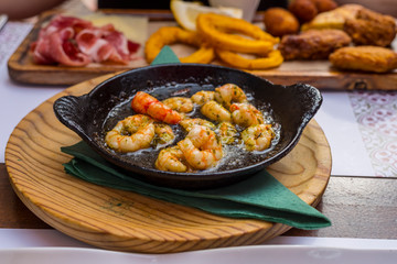 Plate of fried spiced prawns