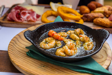 Plate of fried spiced prawns