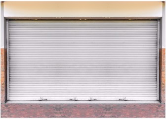 Steel shutter door of warehouse, storage or storefront for metal door background and textured.