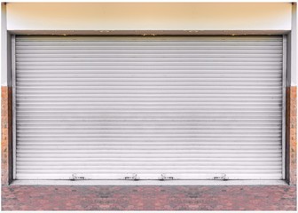 Steel shutter door of warehouse, storage or storefront for metal door background and textured.