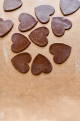 Chocolate hearts on background. Chocolate heart on wooden background