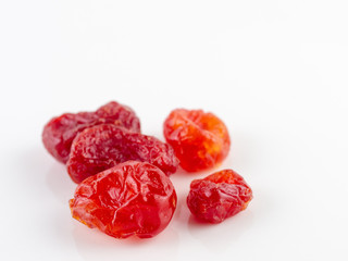 Sun-dried cocktail tomatoes on white background, Dried tomato