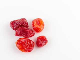 Sun-dried cocktail tomatoes on white background, Dried tomato