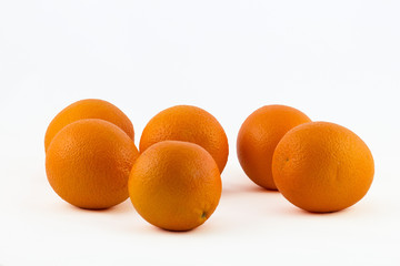 fresh oranges on white background