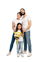 happy latin parents standing near cute daughter with flowers isolated on white