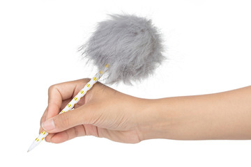 Hand holding Fluffy Ball Pen isolated on white background