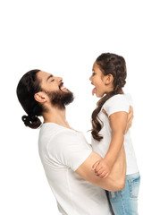 happy latin father smiling while holding in arms cute daughter showing tongue isolated on white