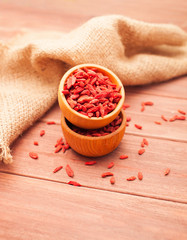 Red dry goji berries for a healthy diet on the table
