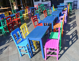 Fototapeta na wymiar Colorful Tables and Chairs in Kas,Turkey