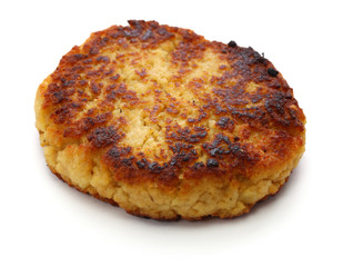 cooked plant based burger patty made from soy meat. 