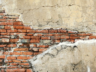 Cracks in the ancient brick wall in the archaeological site
