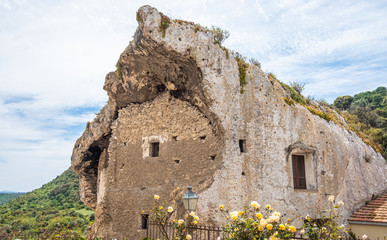 Domus de Janas Sa Rocca in the village of Sedini, province of Sassari , Sardinia, Italy.  Prehistorical chamber tombs