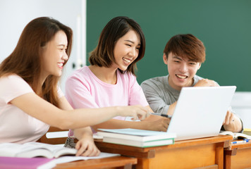 group of  college student discussing in  classroom