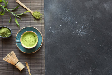 Still life with Japanese matcha green tea on black table. Top view. Space for text.