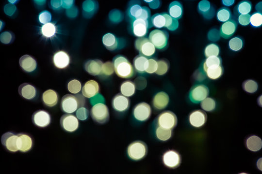 A Bokeh effect background utilizing random lights with cool tones colors.
