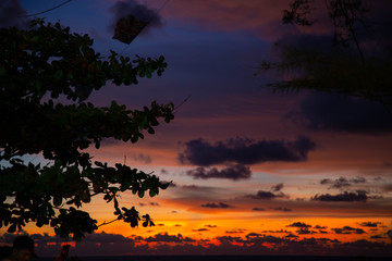 Beautiful color of nature orange and blue sky touch the edge of the sea.