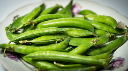 green peas on the table, harvest