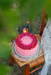 raspberries cake with candle