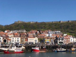view of Scarborough castle from the harbour