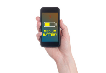 Hand holding black Smartphone with blank screen on white backgroun. Battery charge indicator. Medium charging level Battery.