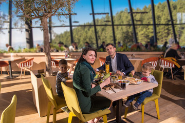 happy family enjoying lunch time together
