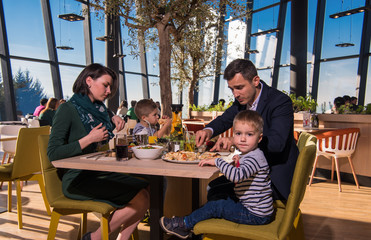 happy family enjoying lunch time together