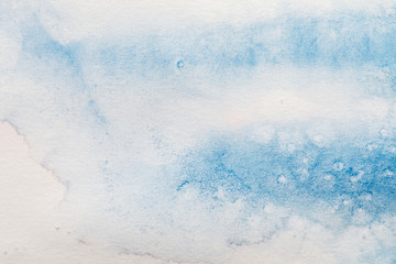blue colorful watercolor paint spill on white background