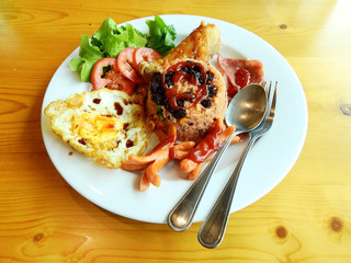 American fried rice in white plate on wood table