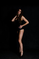 Fototapeta na wymiar High sexy brunette lingerie studio portrait