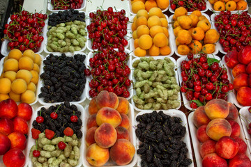 Georgia, the local bazaar. Sale of national sweets from grapes and nuts - 