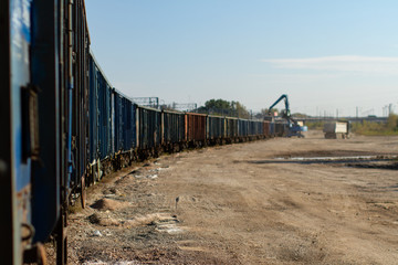 Fototapeta premium Loading a freight train on the siding.