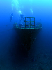 Boga shipwreck. The artificial reef. Underwater treasure. Diving, divers, wide angle underwater photography.