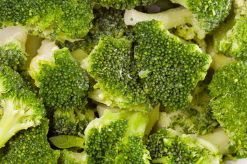 frozen green broccoli top view background. Top view, flat lay, copy space