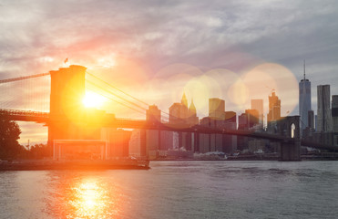 Sunset over a Brooklyn Bridge.
