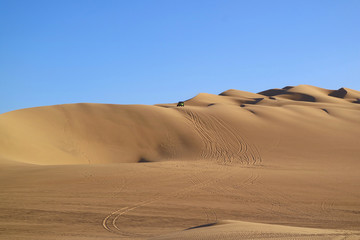 Incredible Sand Dunes with Sand Ripples and the Wheel Prints of Dune Buggies, Huacachina Desert, Ica, Peru