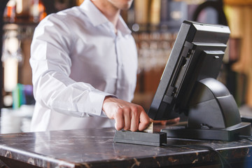 Hand Swiping Credit Card In Store.