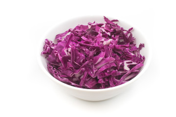 Cabbage cut into thin strips in a bowl